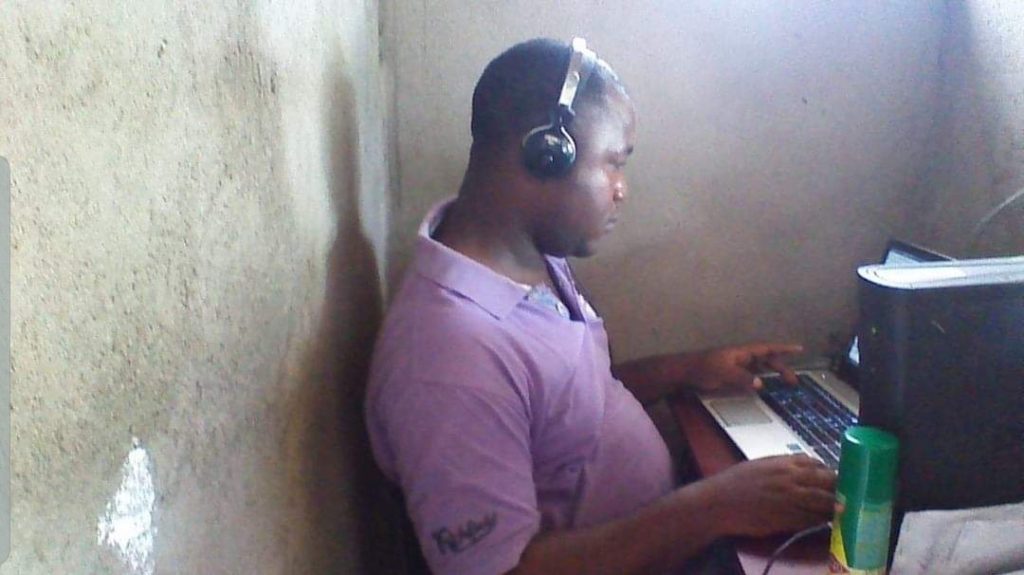 Zuo Bruno, during his humble beginnings, spending time in a Cyber Café in Limbe, South West of Cameroon.